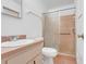 Bathroom with a shower, toilet, and sink at 728 E Clifford Ave, Eustis, FL 32726