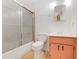 Standard bathroom equipped with a shower, toilet, and vanity at 728 E Clifford Ave, Eustis, FL 32726