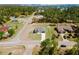 New home construction boasting a long driveway, modern design, and spacious yard in a serene wooded neighborhood at 741 Marion Oaks Ln, Ocala, FL 34473