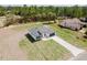 Aerial view of a newly constructed home with a long driveway at 741 Marion Oaks Ln, Ocala, FL 34473