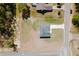 Aerial top-down view of a new home construction with a long driveway and simple landscaping at 741 Marion Oaks Ln, Ocala, FL 34473