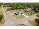New construction home featuring a modern design, attached garage, and spacious yard in a serene, wooded neighborhood at 741 Marion Oaks Ln, Ocala, FL 34473