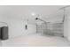 Spacious garage with garage door and equipment at 741 Marion Oaks Ln, Ocala, FL 34473