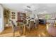 Dining area with modern lighting open to updated kitchen and stylish decor at 789 Errol Pkwy, Apopka, FL 32712