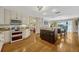 Well-lit kitchen with modern appliances and seamless transition to dining area at 789 Errol Pkwy, Apopka, FL 32712