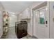 Laundry room with washer, dryer, built-in cabinets and a door leading to the exterior at 789 Errol Pkwy, Apopka, FL 32712