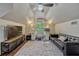 Comfortable living room and work area featuring hardwood floors and ample natural light at 789 Errol Pkwy, Apopka, FL 32712