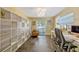 Office space with ample shelving, a large window for natural light, and tile floors at 789 Errol Pkwy, Apopka, FL 32712