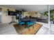 Covered patio dining with an outdoor kitchen at 789 Errol Pkwy, Apopka, FL 32712