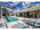The screened-in pool and patio have ample space and outdoor lounging possibilities at 789 Errol Pkwy, Apopka, FL 32712