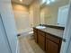 Bathroom with vanity and shower-tub combo at 8271 Maritime Flag St # 125, Windermere, FL 34786
