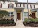 Charming two-story home featuring a well-manicured lawn and inviting front entrance at 8271 Maritime Flag St # 125, Windermere, FL 34786