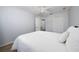 Comfortable bedroom features wood floors, closet, and natural light from an adjacent room at 918 Emerald Green Ct, Kissimmee, FL 34746
