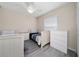 Bedroom with two beds, wood floors and white trim at 918 Emerald Green Ct, Kissimmee, FL 34746
