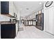 Well-equipped kitchen with stainless steel appliances, granite countertops, and ample cabinet space, great for cooking at 918 Emerald Green Ct, Kissimmee, FL 34746