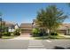 Charming home featuring a two-car garage, well-maintained landscaping, and a beautiful tile roof at 9895 Winnington St, Orlando, FL 32832