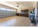 Spacious three car garage with epoxy floor and custom storage cabinets at 9895 Winnington St, Orlando, FL 32832