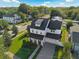 Beautiful aerial view of a home showcasing its manicured lawn, professional landscaping, and surroundings at 1114 Georgia Blvd, Orlando, FL 32803