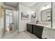 Modern bathroom features dual sinks, white countertops, and an open doorway into the main bedroom at 1114 Georgia Blvd, Orlando, FL 32803