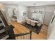 Bright dining room showcases wainscoting, modern chandelier, and natural light at 1114 Georgia Blvd, Orlando, FL 32803