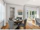 Cozy dining area with seating for four and easy access to the outdoor patio at 1114 Georgia Blvd, Orlando, FL 32803
