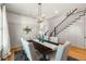 Elegant dining room features stylish wainscoting, chandelier, and seating for six at 1114 Georgia Blvd, Orlando, FL 32803