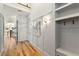 Open foyer with hardwood floors, stylish wall decor, and a view of the staircase at 1114 Georgia Blvd, Orlando, FL 32803