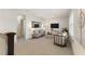 Bright living area with neutral tones, comfortable seating, and modern decor elements at 1114 Georgia Blvd, Orlando, FL 32803