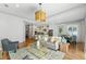 Open-concept living area with hardwood floors, modern decor, and seamless flow at 1114 Georgia Blvd, Orlando, FL 32803