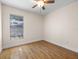Bedroom with window and neutral walls at 118 White Birch Dr, Kissimmee, FL 34743
