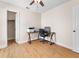 Bedroom with fan, desk, closet, and office setup at 118 White Birch Dr, Kissimmee, FL 34743