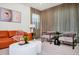 Comfortable living room features contemporary furniture, stylish decor and neutral palette at 1293 Emerald Row, Clermont, FL 34714