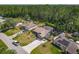 Aerial view of a single Gathering home featuring a fenced pool and extended driveway at 1296 Gage Ave, Deltona, FL 32738