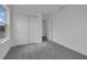 Bedroom features closet space and an open doorway at 1343 Wood Line Dr, Deland, FL 32720
