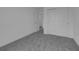 Bedroom includes closet space and an open doorway at 1343 Wood Line Dr, Deland, FL 32720