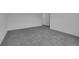 Neutral carpet in an empty bedroom space at 1343 Wood Line Dr, Deland, FL 32720