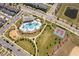 This aerial view showcases the pool, park, and outdoor amenities at 14143 Title Way, Winter Garden, FL 34787