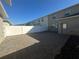 This backyard has a brick-paved floor, with a white fence bordering the property at 14143 Title Way, Winter Garden, FL 34787