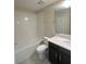 Full bathroom with a tub, toilet and a vanity with ample storage space at 14143 Title Way, Winter Garden, FL 34787