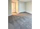 This carpeted bedroom features a closet and entrance to additional spaces at 14143 Title Way, Winter Garden, FL 34787