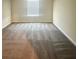 Neutral-toned bedroom with carpeting and a window offering natural light at 14143 Title Way, Winter Garden, FL 34787