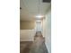 Upstairs hallway with neutral walls and carpeting at 14143 Title Way, Winter Garden, FL 34787
