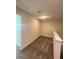 A cozy upstairs loft featuring neutral walls and carpet at 14143 Title Way, Winter Garden, FL 34787