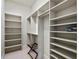 Well-organized walk-in closet features ample shelving for clothing and accessories storage at 1526 Bluewater Run, Chuluota, FL 32766
