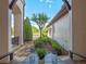 Courtyard featuring a tranquil setting, beautiful landscaping, and a peaceful bench at 1526 Bluewater Run, Chuluota, FL 32766