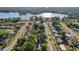 An aerial view of the neighborhood near a beautiful lake at 1656 Brentlawn St, Deltona, FL 32725