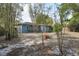 Backyard showing lush landscaping and a serene atmosphere at 1656 Brentlawn St, Deltona, FL 32725