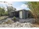 Backyard featuring a covered patio and a small storage shed at 1656 Brentlawn St, Deltona, FL 32725