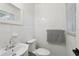 Bright, white bathroom with classic fixtures and decor at 1656 Brentlawn St, Deltona, FL 32725