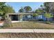 Charming single-story home with well-maintained lawn and mature trees at 1656 Brentlawn St, Deltona, FL 32725